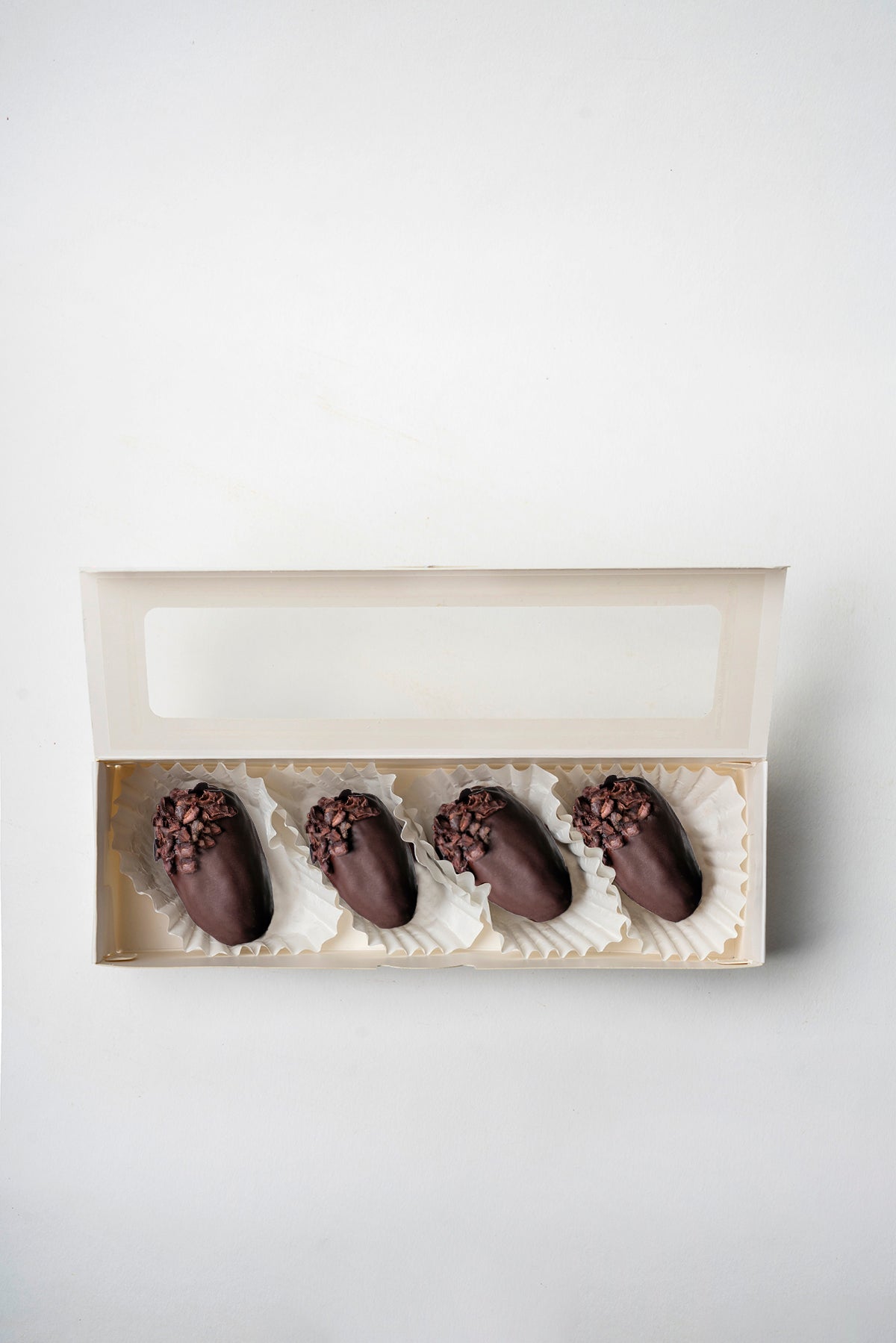 Dátil con caramelo y cubierto en chocolate