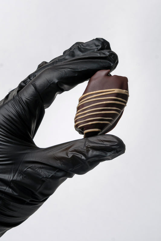 Dátil con coco y cubierto en chocolate