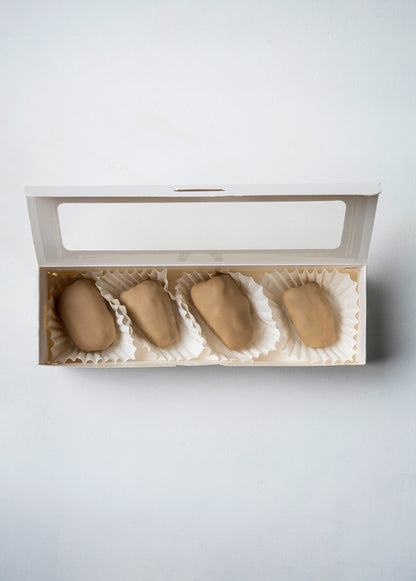 Dátil con coco y cubierto en chocolate